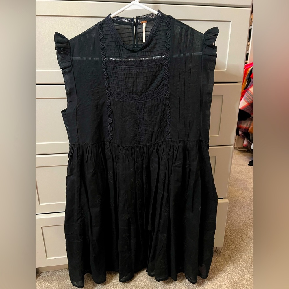 Black FREE PEOPLE sheer, embroidered, pleated delicate detail sleeveless dress.